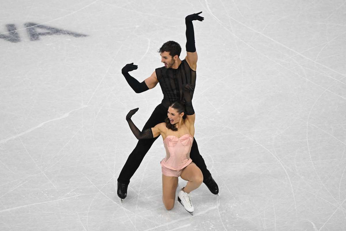 Vogue Madonna i a congratulat pe francezii care au castigat medalia de aur la programul scurt de patinaj artistic la Olimpiada